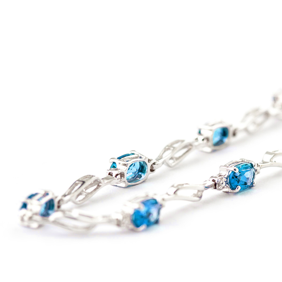 14K. GOLD TENNIS BRACELET WITH BLUE TOPAZ & DIAMONDS (White Gold) - Picture 3 of 6